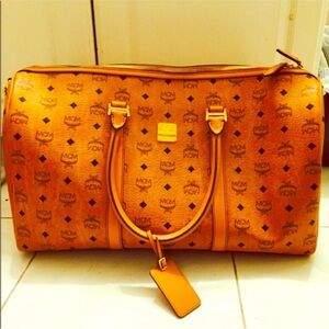 100% Authentic MCM Orange Monogram Travel/Duffle Bag